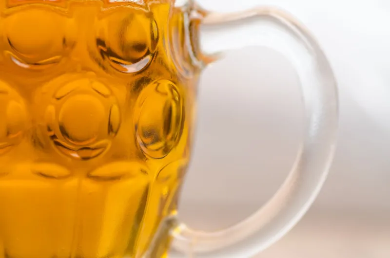 Lean, Pour, Repeat: The Hidden Science Connecting Cornering Physics to Craft Beer Foam